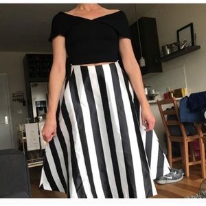 Black crop top and black and white skirt